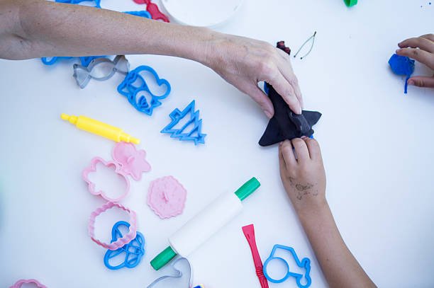 istock Child back to school molding clay and making crafts 2227334565