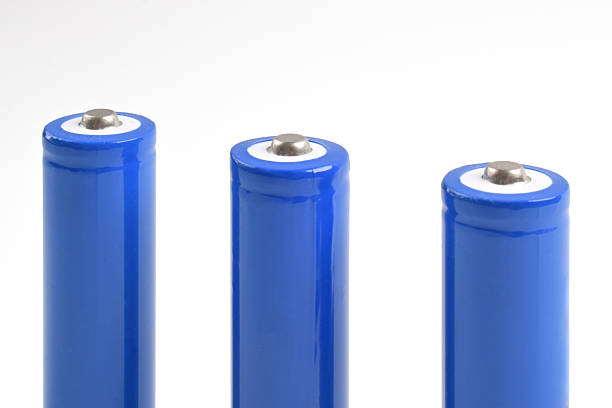 Blue metal AA-size batteries isolated on white background. Carbon zinc batteries, rechargeable batteries, mockup