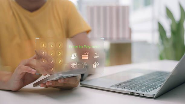 istock Digital payment concept showing person using smartphone to enter PIN code with virtual keypad interface, symbolizing secure online transaction, e-wallet, fintech innovation, and mobile banking. 2227338342