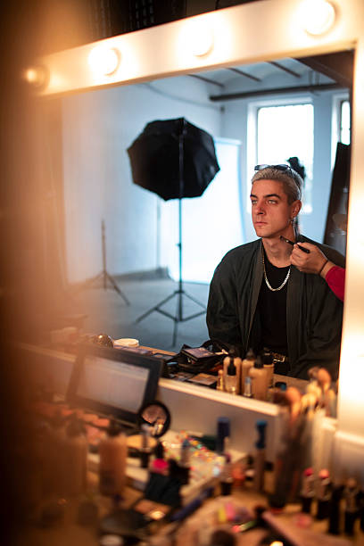 istock Male in Makeup Photography Studio 2227339008