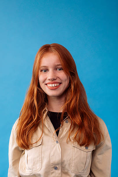 istock Smiling Redheaded Girl 2227339552