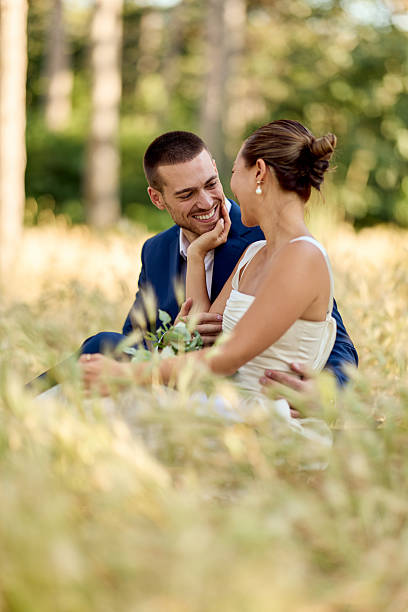 istock Romantic Couple Enjoying a Beautiful Outdoor Setting on Their Wedding Day 2227339870