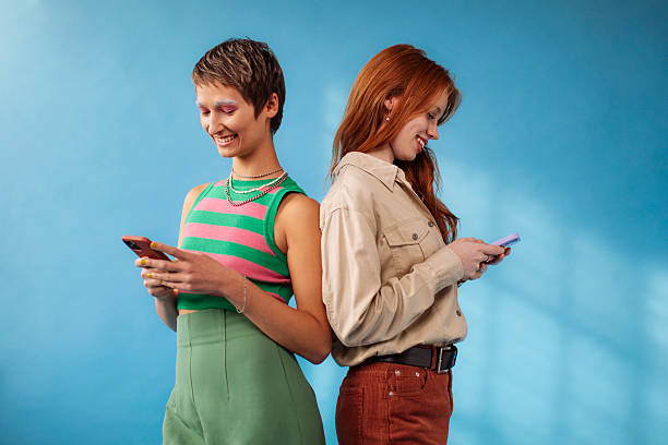 istock Girls texing 2227340453