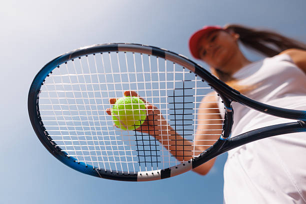 istock young tennis player playing tennis, bottom view 2227342881