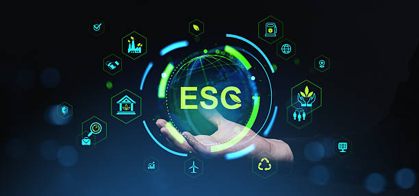 istock ESG sustainability concept with glowing digital globe and green icons hovering above open hand on dark background, representing environmental responsibility. 2227342924
