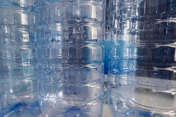 istock Empty plastic water bottles prepared for recycling, showing waste separation, environmental responsibility and sustainable living practices 2227346462