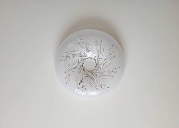 istock Round glass white chandelier on the ceiling 2227347798