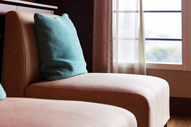 Real photo of colorful pillows on a sofa. Detail image of colorful cushion on sofa, living room, modern house, home decoration