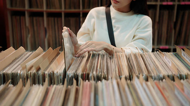 istock Spending the day digging through records, looking for the perfect vinyl 2227350865