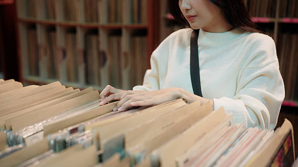 istock Spending the day digging through records, looking for the perfect vinyl 2227350873