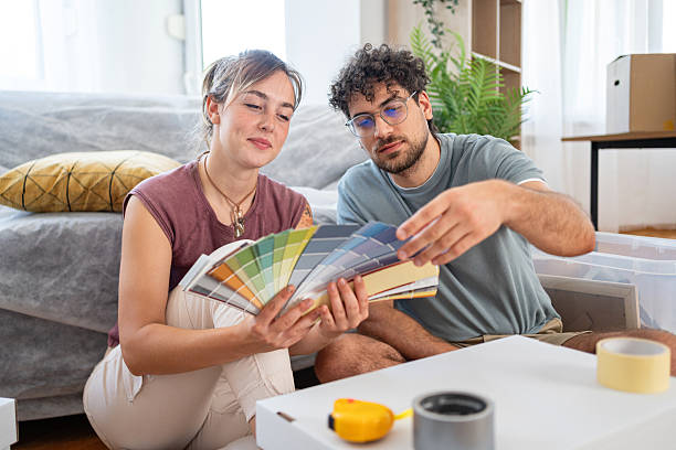 istock Relaxed young couple deciding on wall colors 2227351272