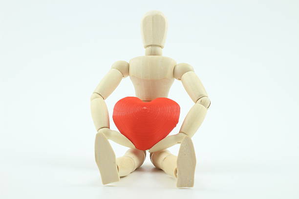 istock Wooden doll's heart, warm feelings. 2227357625