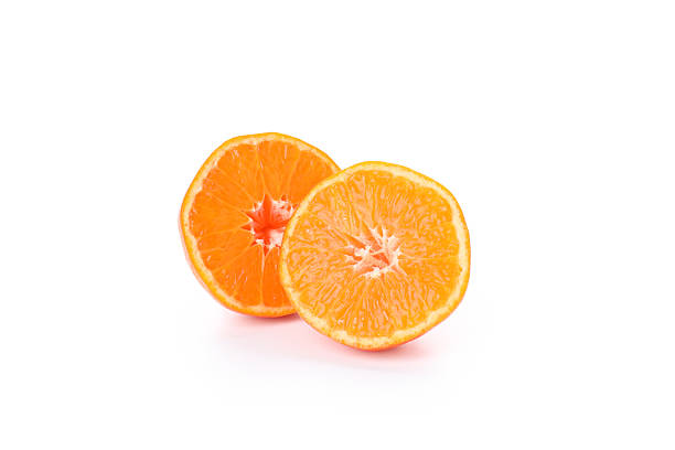 istock Halves of mandarin isolated on white background 2227359901