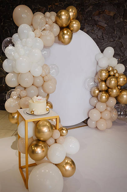 istock Elegant party decoration with cake and balloons. 2227360331