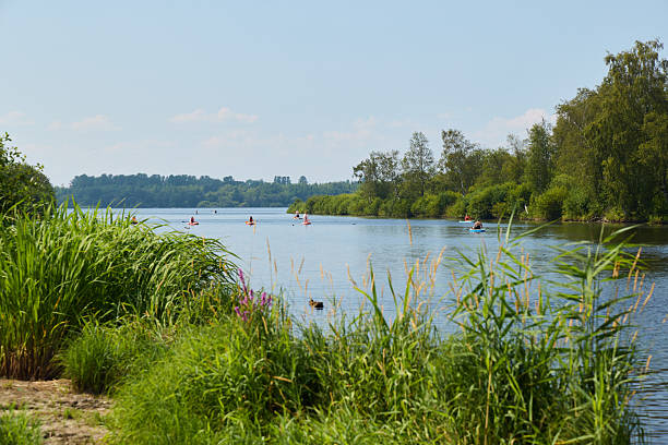 istock A tranquil and serene river landscape featuring enthusiastic kayakers amidst lush greenery 2227363364