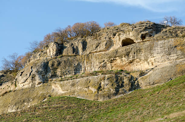 istock Rocky cliffside in Crimea with cavern openings 2227363629