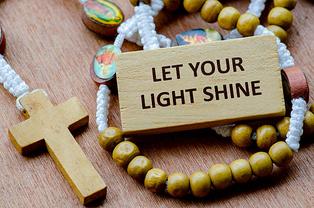 istock Rosary With Message LET YOUR LIGHT SHINE in Focus 2227368045