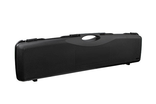 istock A closed, black, textured hard case designed for a long gun, featuring a carrying handle and latches, presented horizontally on a white background. 2227369082