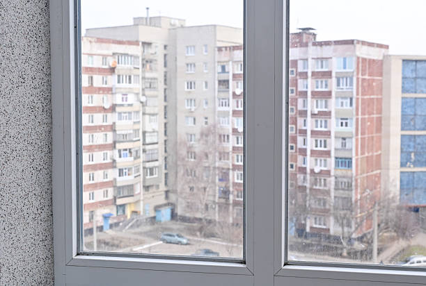 istock Bright apartment with large window letting in natural light. Quiet atmosphere and window create modern cozy apartment look. 2227369927