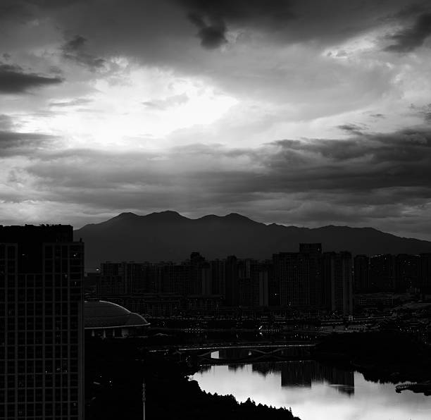 istock City is under dark storm clouds 2227370280