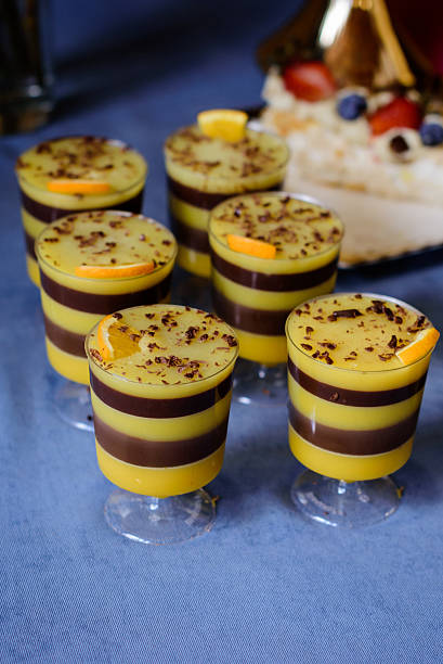 istock A delectable array of layered chocolate and orange desserts in individual serving glasses, perfect for an elegant event or sweet indulgence 2227375749