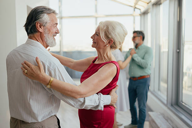 istock Seniors Laughing and Dancing Together 2227376829