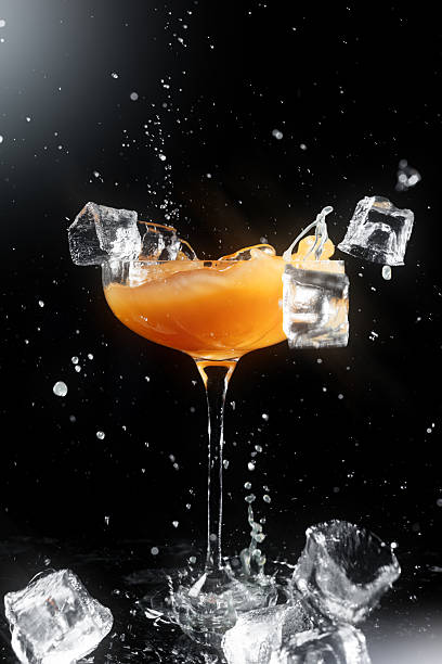 istock Splashing Cocktail with Ice Cubes in Motion 2227377483
