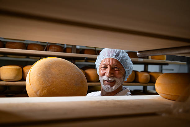 istock Traditional production of quality cheese. 2227381817