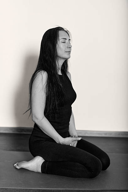 istock Serene meditation in black and white yoga scene 2227383085