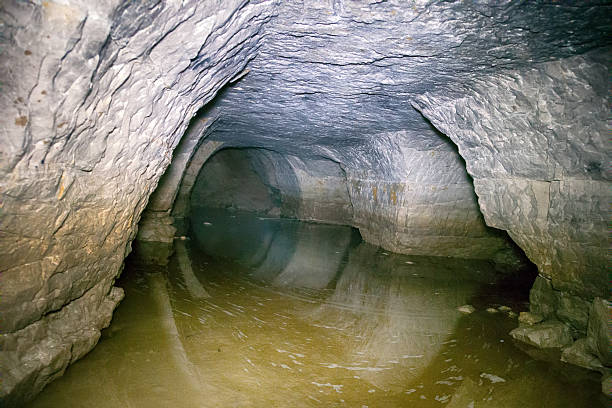 istock partially flooded underground caves catacomb 2227384346