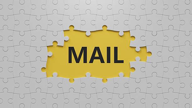 istock Mail.The white puzzle pieces with missing pieces spelling.Flat lay view from above on The white puzzle pieces with missing pieces buttons.IT technology concept.3D rendering on yellow background. 2227384415