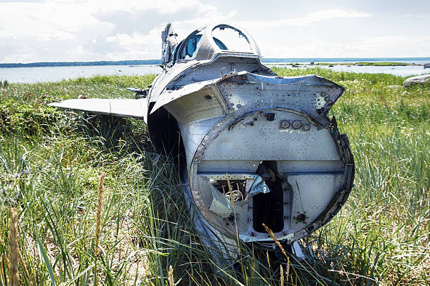 war plane crashed on shore of sea several years ago and lies on dunes