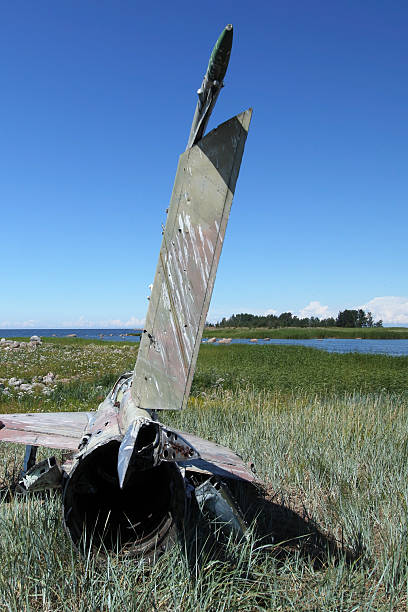 istock war plane crashed on shore of sea several years ago and lies on dunes 2227385607