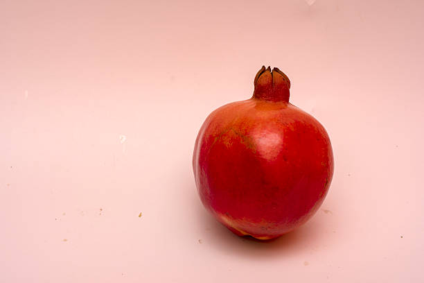istock Fresh Organic Red Pomegranate Isolated on White Background 2227388780