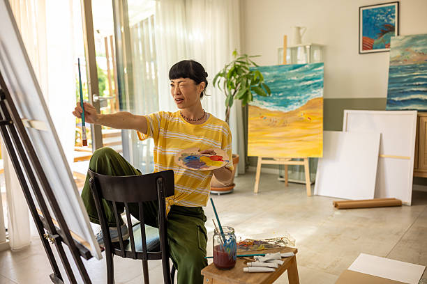 istock Asian artist working on a new canvas 2227392337