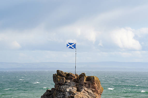 istock The Scottish flag flying in the wind 2227399433