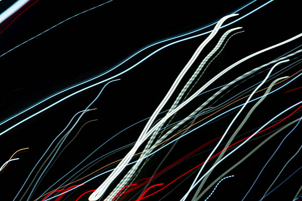 Abstract background with geometric elements and colorful lines on a black background. Copyspace concept. Photographic effect.