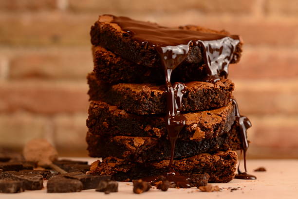 istock Chocolate brownie slides with chocolate syrup 2227401483