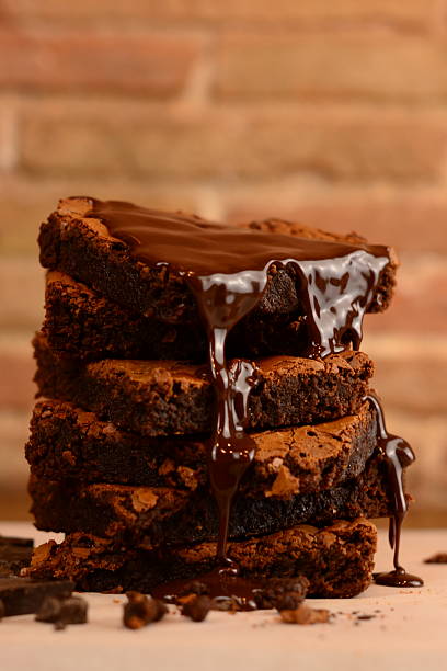 istock Chocolate brownie slides with chocolate syrup 2227401485