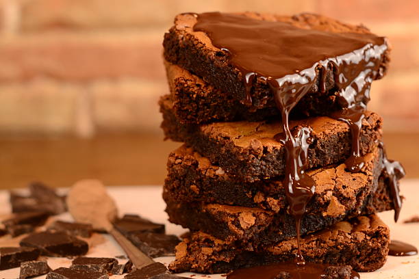 istock Chocolate brownie slides with chocolate syrup 2227401489