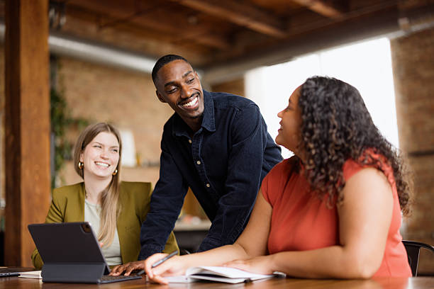 istock Young businesspeople collaborating on a project in a modern office 2227404321