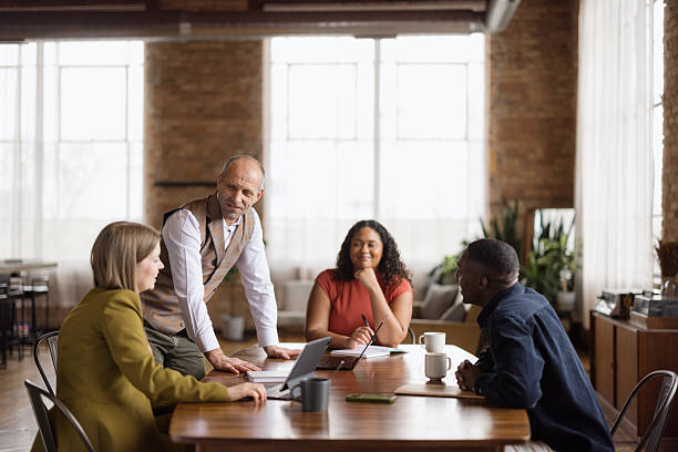 istock Business team collaborating on a project in a modern office 2227404352