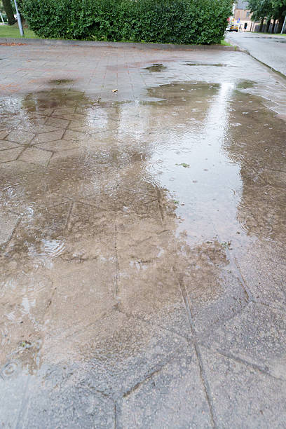 istock Flooding city after heavy rain, large puddles 2227405906