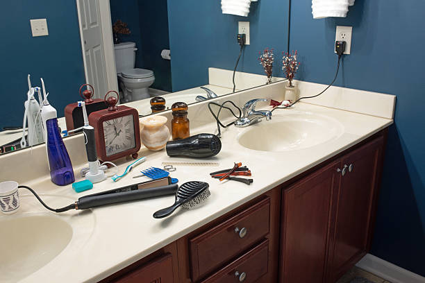Left View of Bathroom Vanity with Hair Care Items stock photo