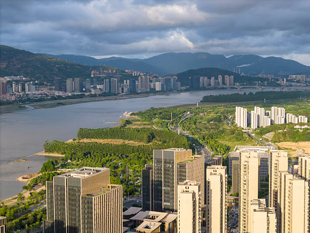 istock Urban Landscape with River and Mountains 2227415902