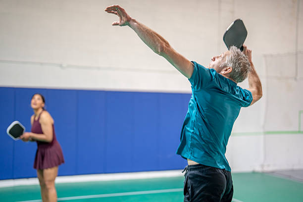 istock Two Focused Players Competing in Exciting Indoor Pickleball Match 2227416358