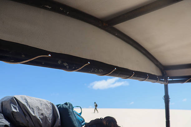 istock Shelter from the sun under canvas and dunes. 2227420949