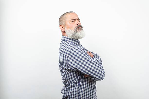 istock Confident older man posing with arms crossed. 2227425381