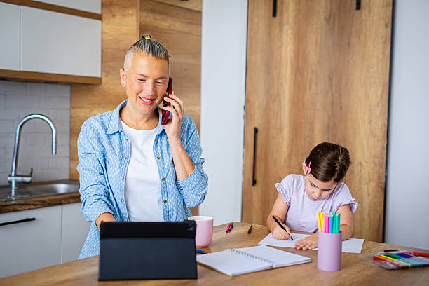 istock Modern Family Life: Balancing Work Calls and Parenting 2227427924
