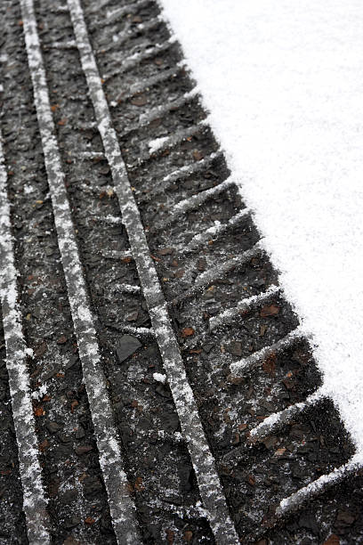 istock Tire print in Snow 2227428712